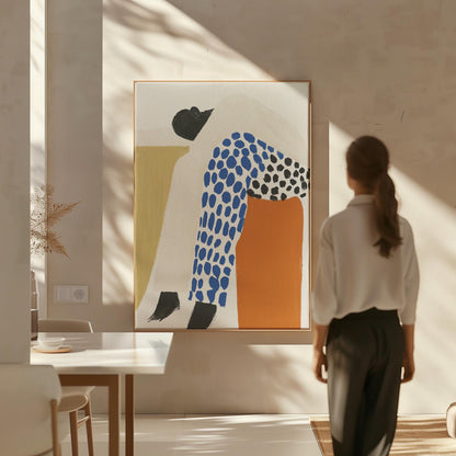 Figurative Canvas Wall Art Woman Resting in Blue and Black Patterned Outfit with Orange Accent Frame