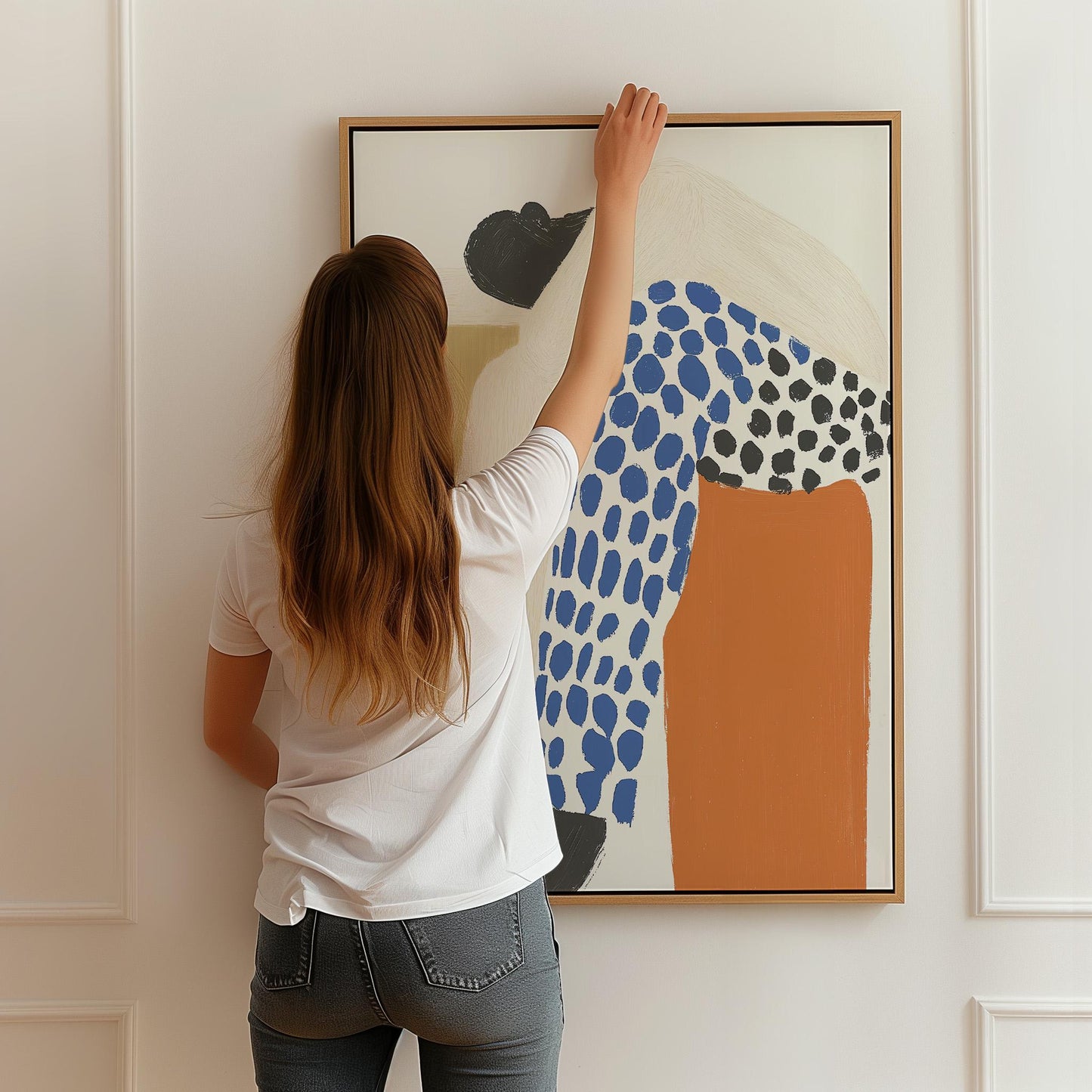 Figurative Canvas Wall Art Woman Resting in Blue and Black Patterned Outfit with Orange Accent Frame