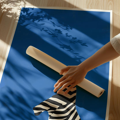 Figurative Canvas Wall Art Woman in Black and White Striped Dress on Bold Blue Background Framed Print