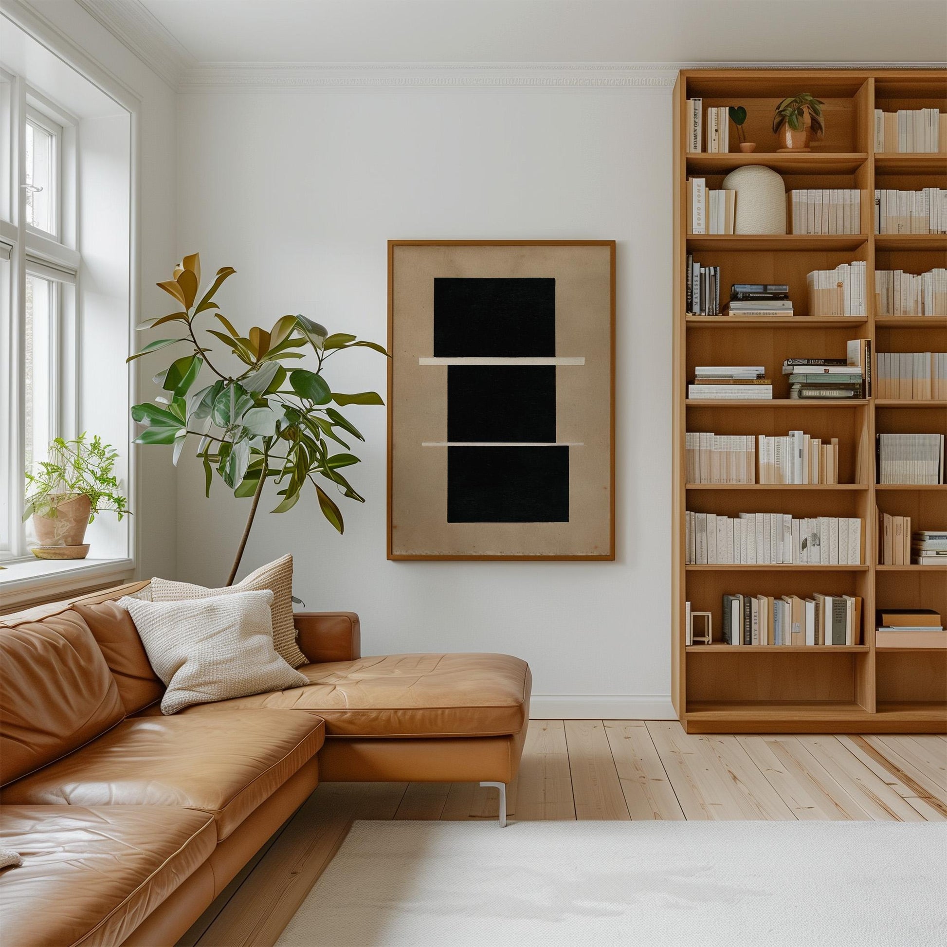 a cozy living room with a large bookshelf filled with books, a comfortable leather sofa, and a large abstract painting on the wall.