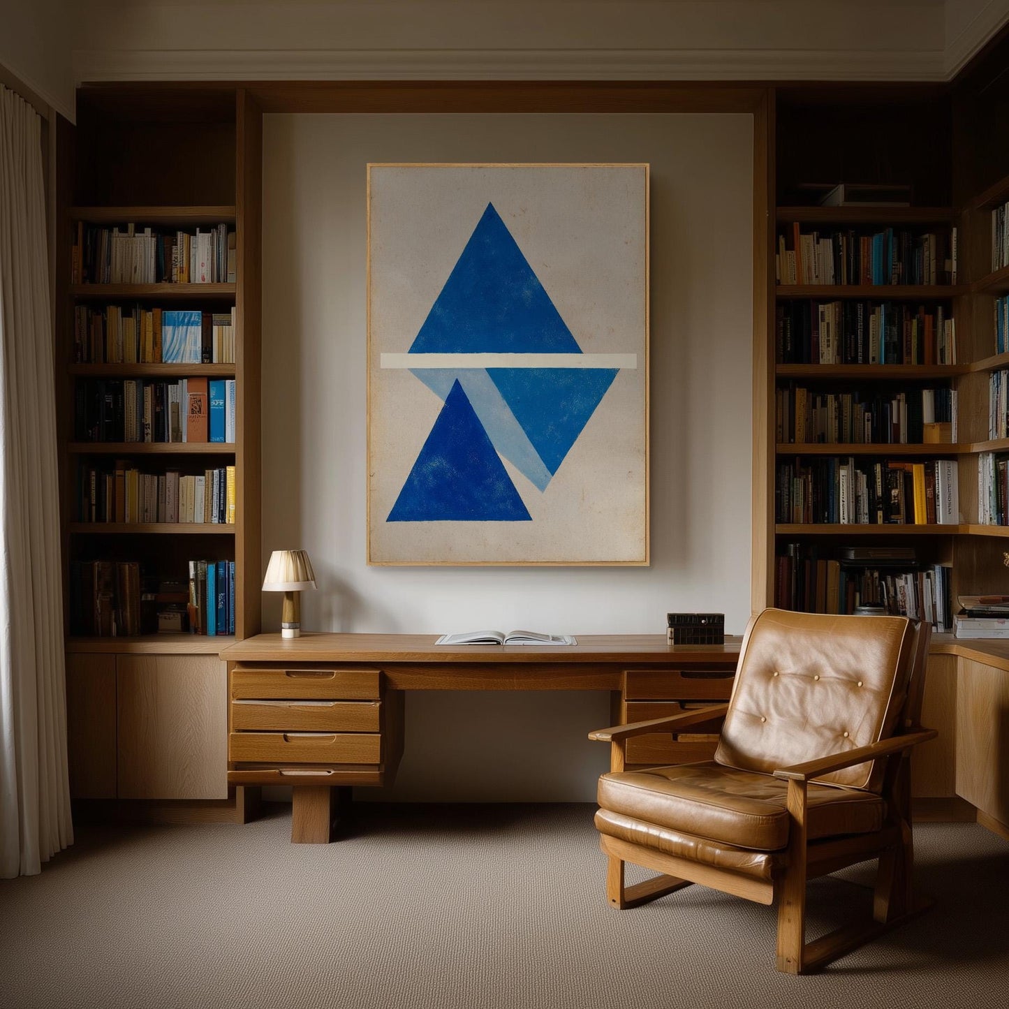 a cozy and well-organized home office with a large wooden desk, a comfortable leather chair, and a large abstract painting on the wall.