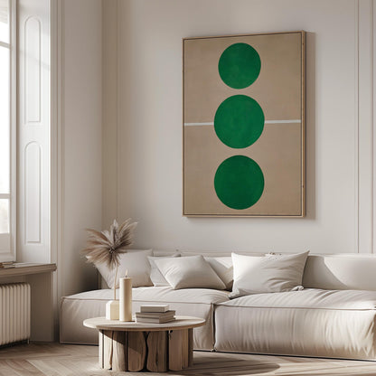 a modern living room with a large abstract painting featuring three green circles on the wall. The room is furnished with a white sofa and a round wooden coffee table.