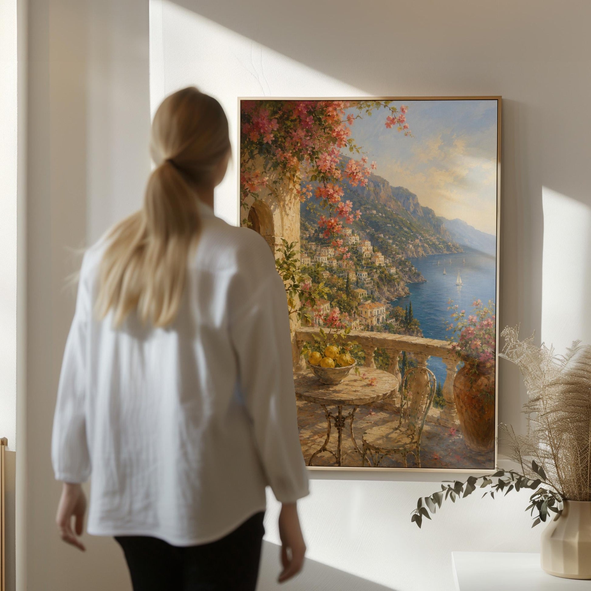Amalfi coast terrace painting with lemons and bougainvillea, canvas print styled against a soft white wall