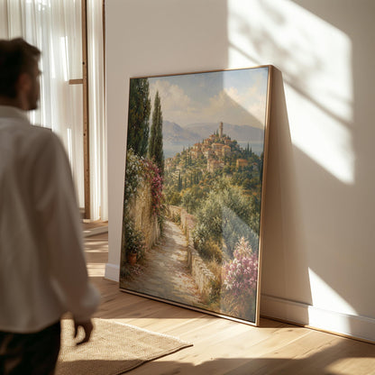 Stone path leading to an Italian hilltop village, canvas print displayed on a neutral wall in a styled interior