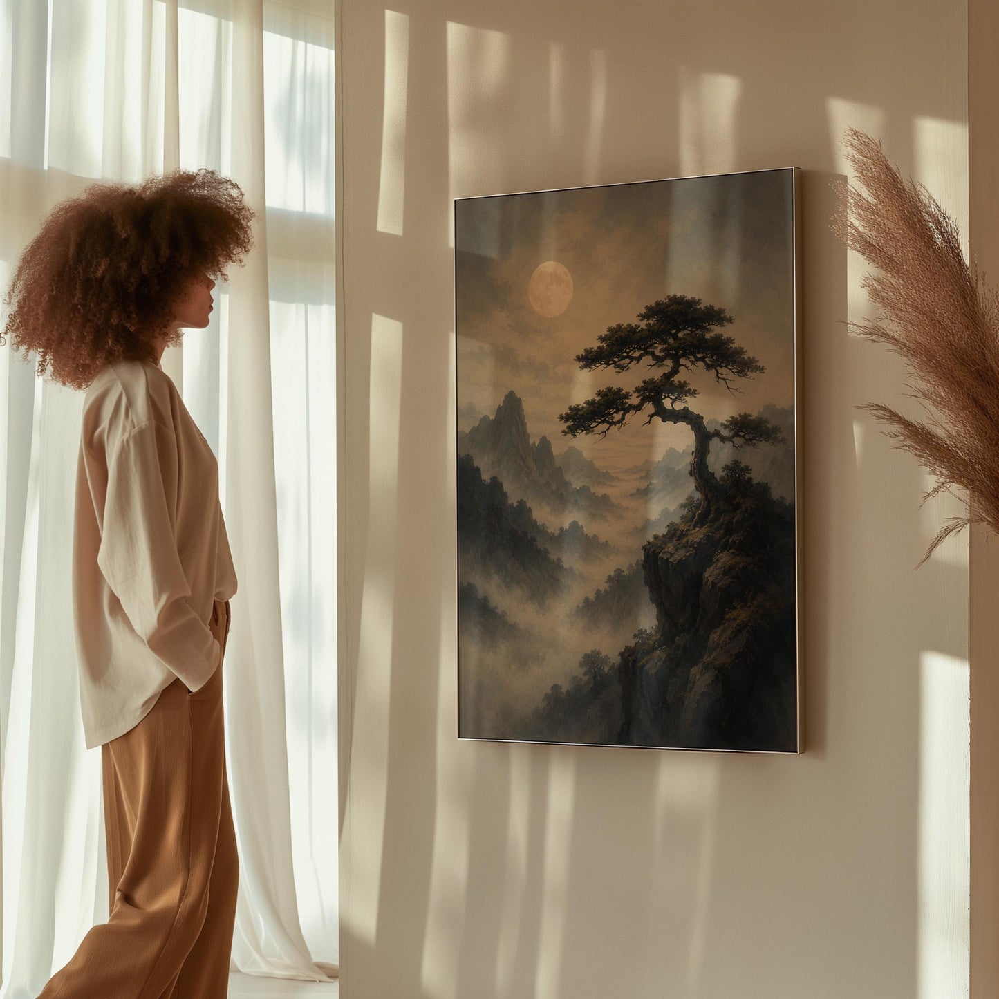 Moonlit misty mountains with a windswept pine tree, canvas wall art seen in a warm interior with natural light