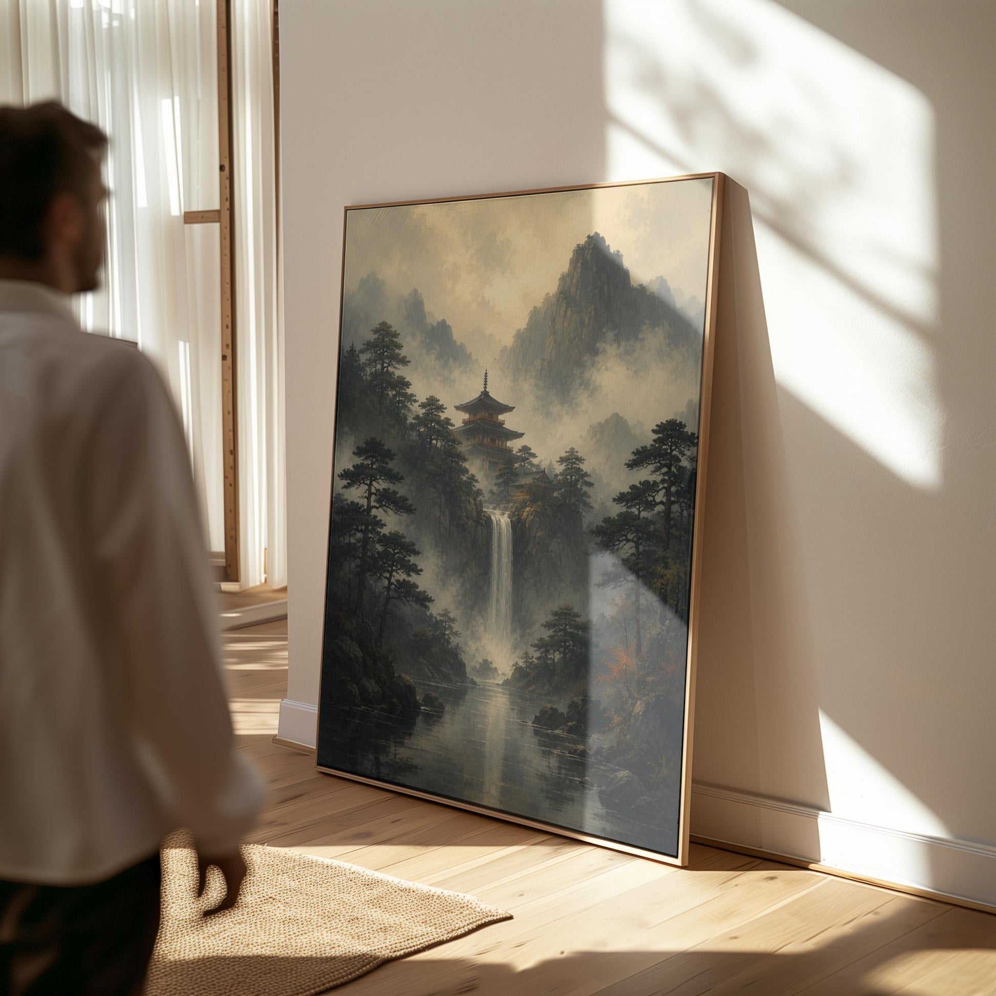 Japanese pagoda above a waterfall in misty pine forest, canvas print presented in a light, minimal room