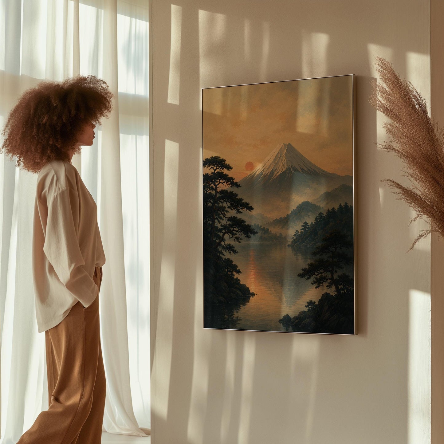 Snow-capped Mount Fuji at sunrise over a still lake, canvas wall art seen in a warm interior with natural light
