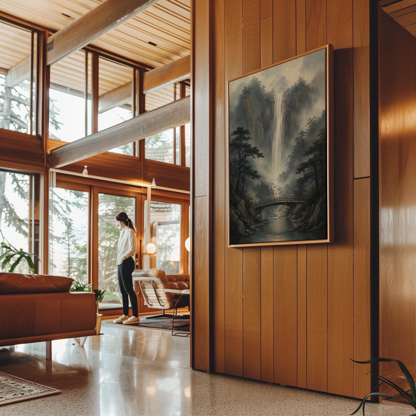 Tall waterfall and wooden bridge in a misty gorge, canvas wall art presented in a light, minimal room