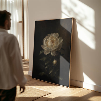 White peony in full bloom against a dark background, canvas wall art hanging in a calm, modern living space