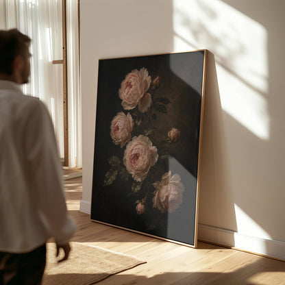 Blush pink garden roses against a dark background, canvas print displayed on a neutral wall in a styled interior