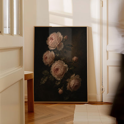 Blush pink garden roses against a dark background, canvas wall art hanging in a calm, modern living space