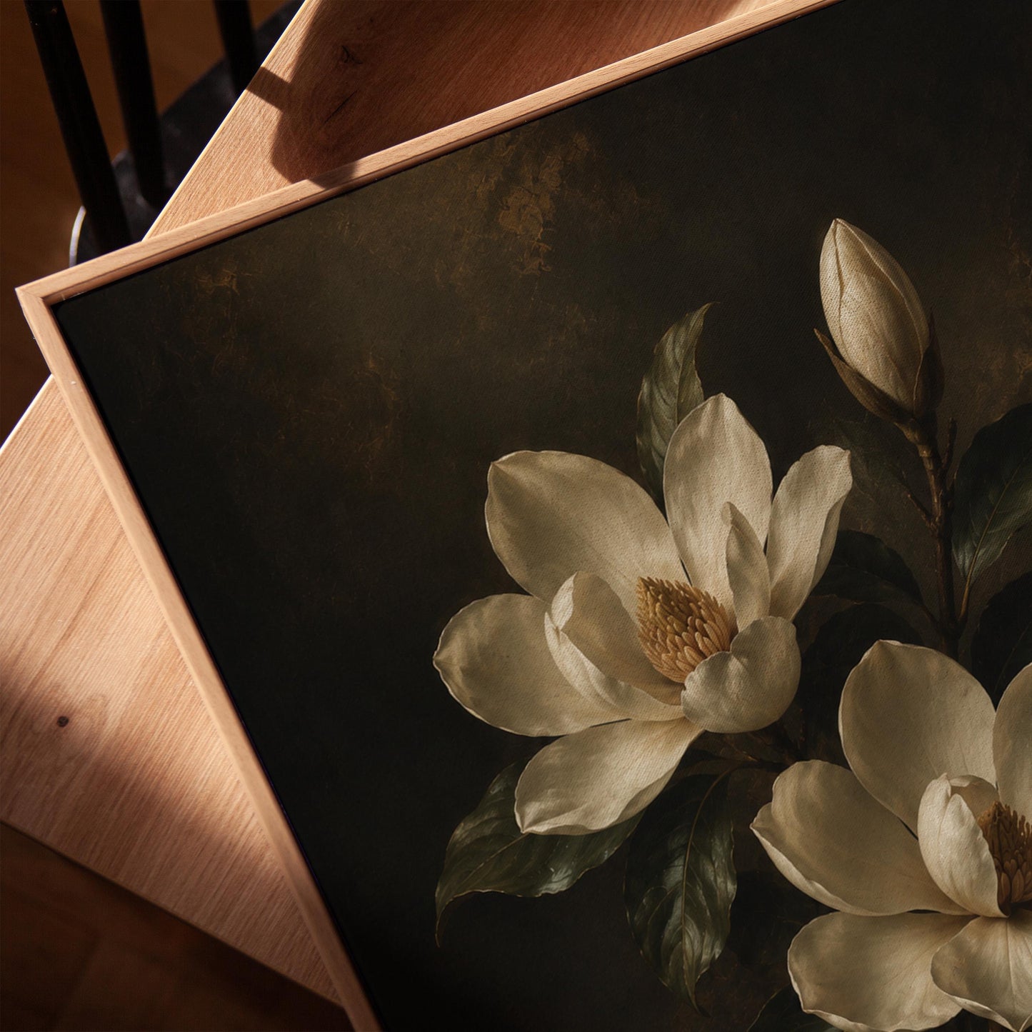 Cream magnolia blooms and dark glossy leaves, canvas print in a warm, minimally styled interior