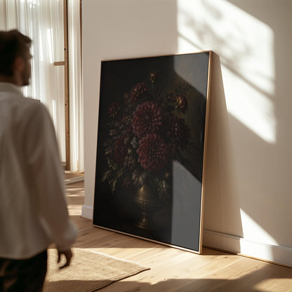 Burgundy dahlias in a brass urn against darkness, canvas print hanging in a calm, modern living space