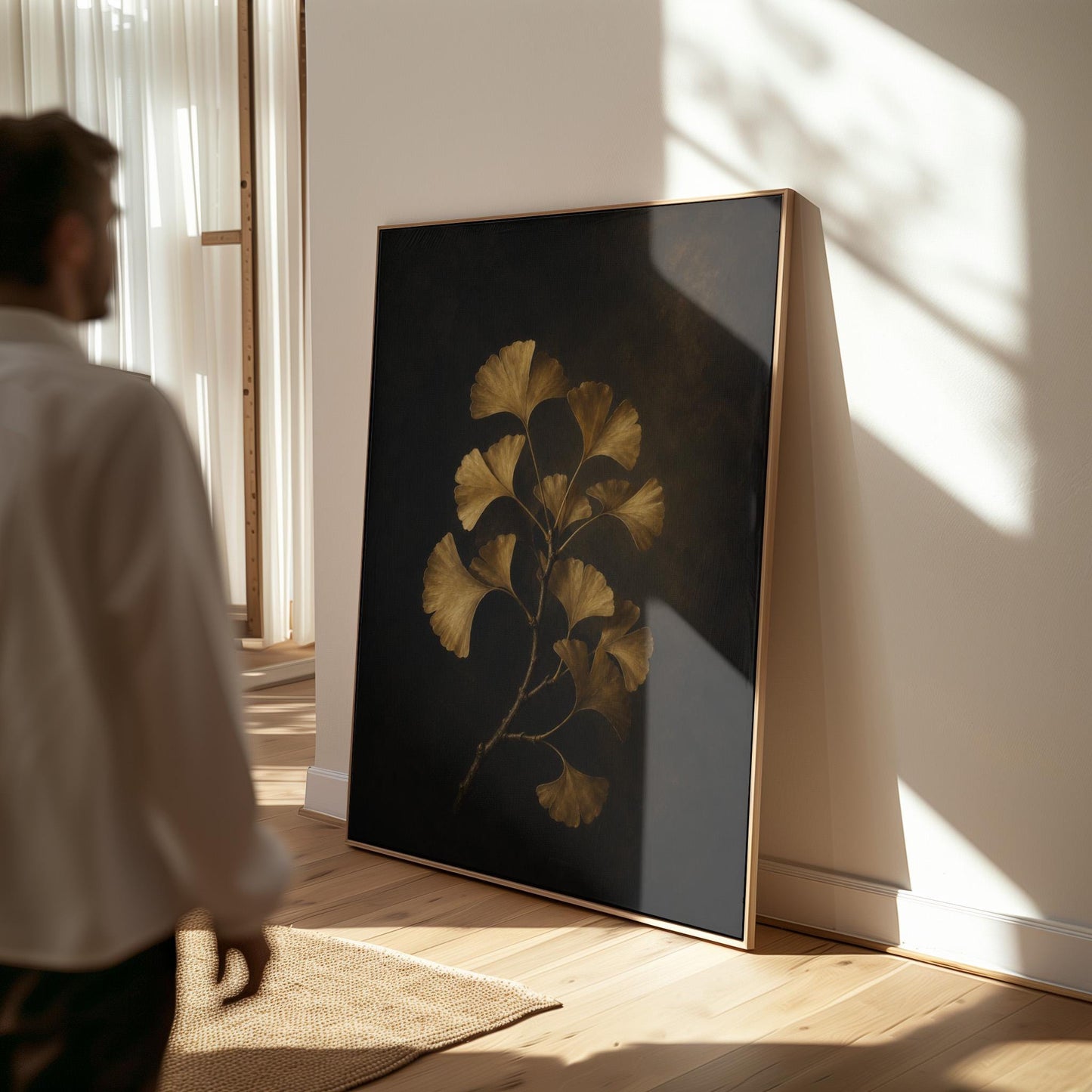 Golden ginkgo branch on a deep charcoal ground, canvas wall art hanging in a calm, modern living space