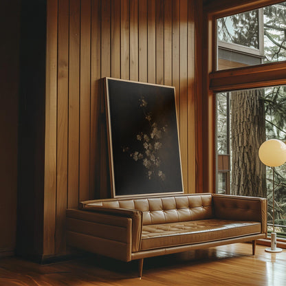 White blossom branch on a dark bronze ground, canvas print hanging in a calm, modern living space