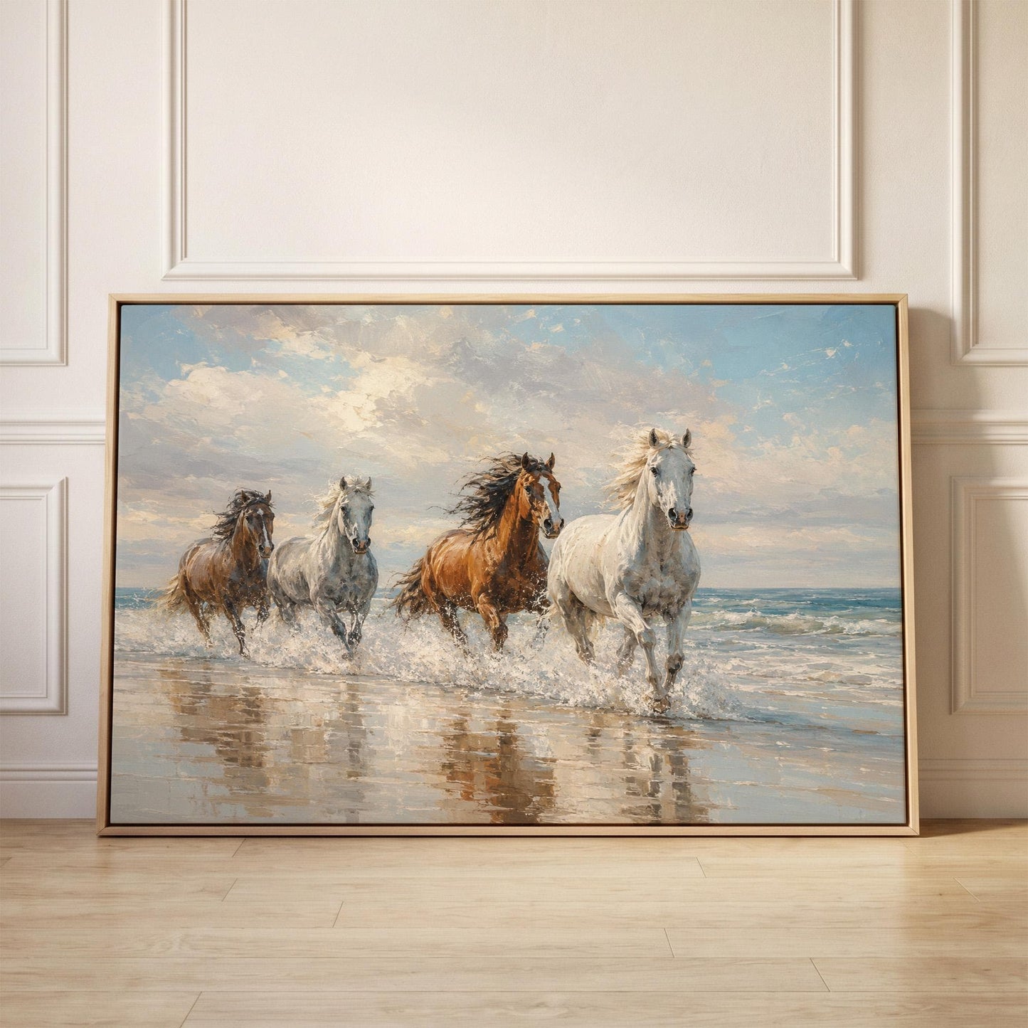 Four horses running through shallow surf on a beach, canvas print held up against a sunlit bedroom wall