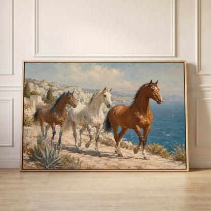 Three horses on a sunlit cliff above a blue Mediterranean bay, canvas print held up against a sunlit bedroom wall