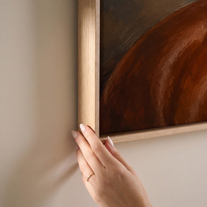 Chestnut horse portrait turning its head in warm light, canvas print shown at full size in a light-filled bedroom