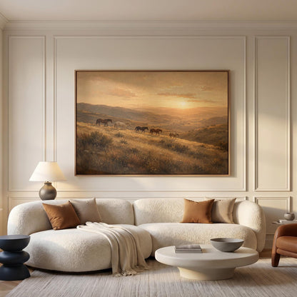Herd of horses on a hillside trail at golden sunset, canvas wall art hanging in a calm, modern living space