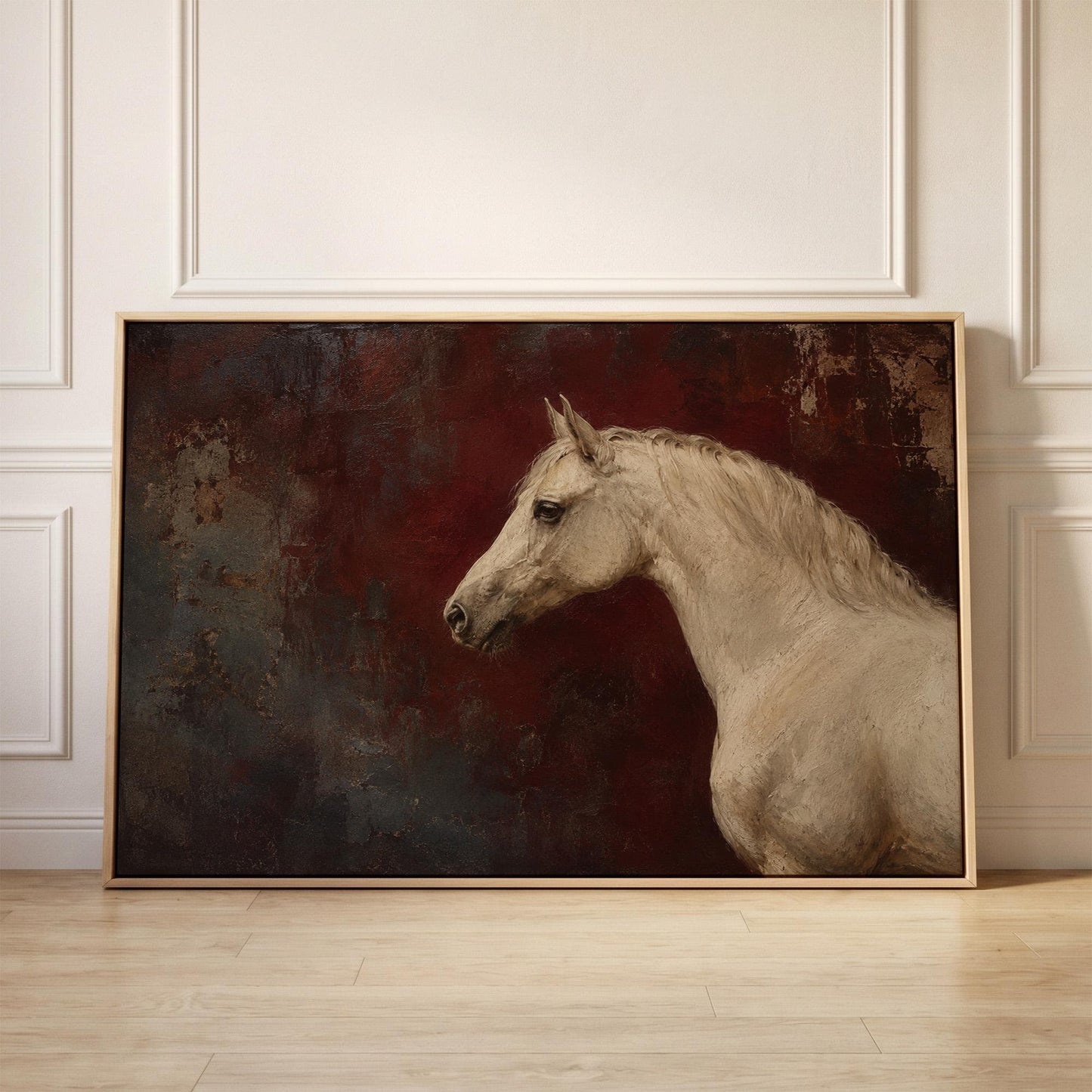 Pale grey horse portrait against a deep oxblood background, canvas print held up against a sunlit bedroom wall