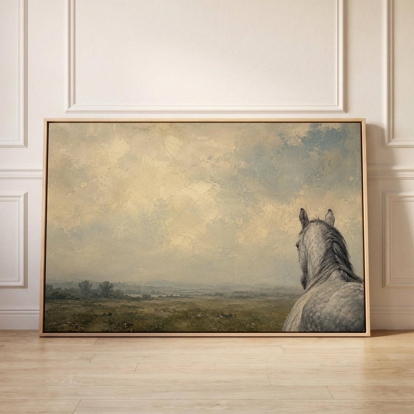 Dapple grey horse looking out over a hazy green valley, canvas print held up against a sunlit bedroom wall