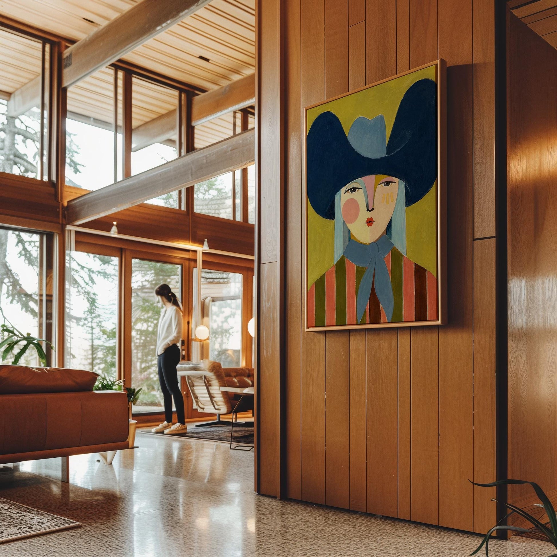 Folk cowgirl in an oversized navy hat and blue neckerchief on mustard, canvas print shown in a sunlit, contemporary room