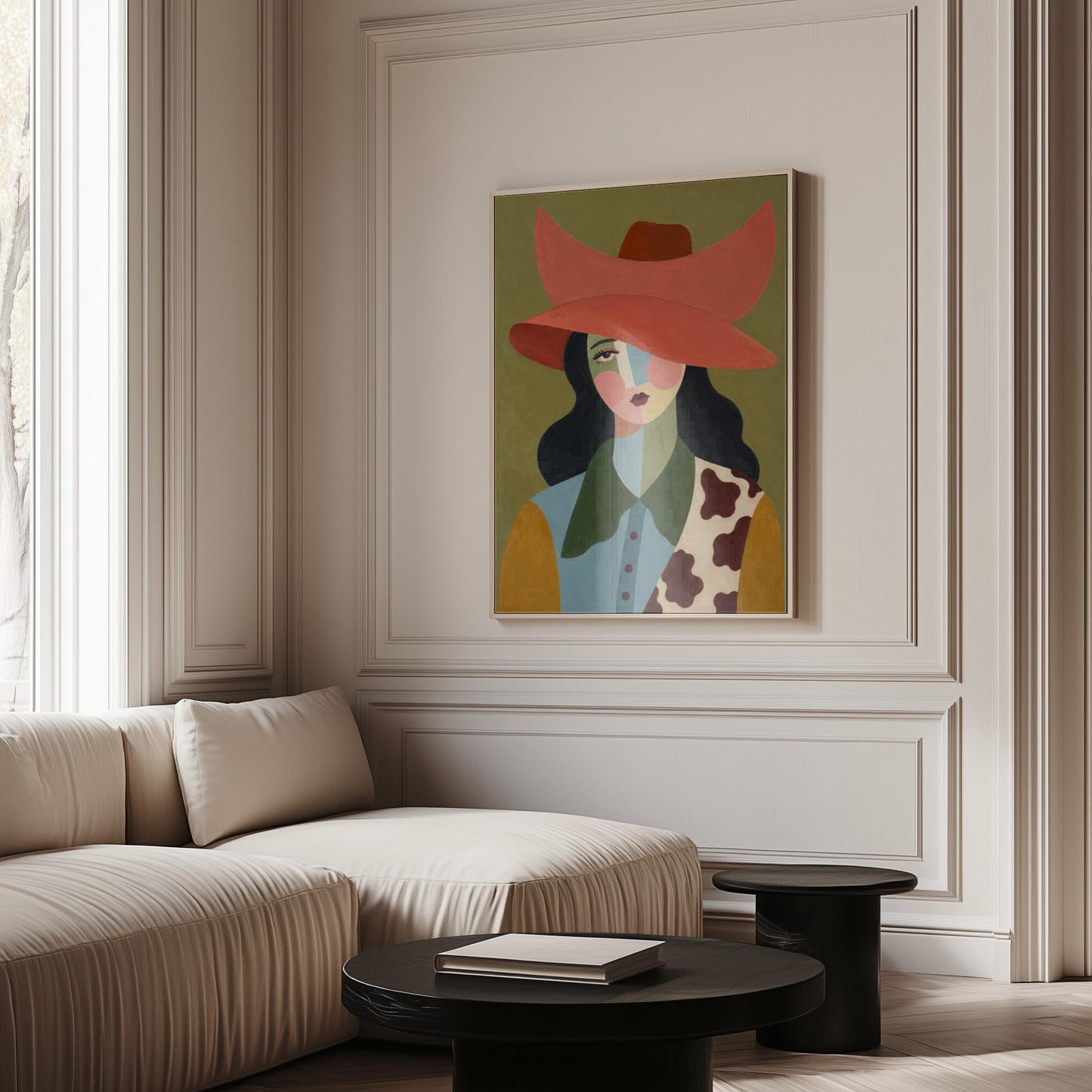 Cowgirl in a wide coral hat with a cubist face and cow-print collar on olive, canvas print seen in a warm interior with natural light