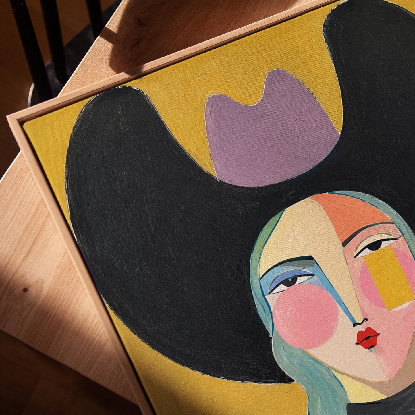 Folk cowgirl with teal hair, a big black hat and striped shirt on golden yellow, canvas print in a warm, minimally styled interior