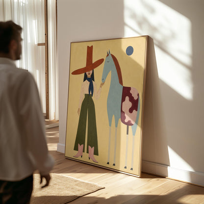 Cowgirl in a red hat standing beside a pale blue spotted horse on warm yellow, canvas print displayed on a neutral wall in a styled interior
