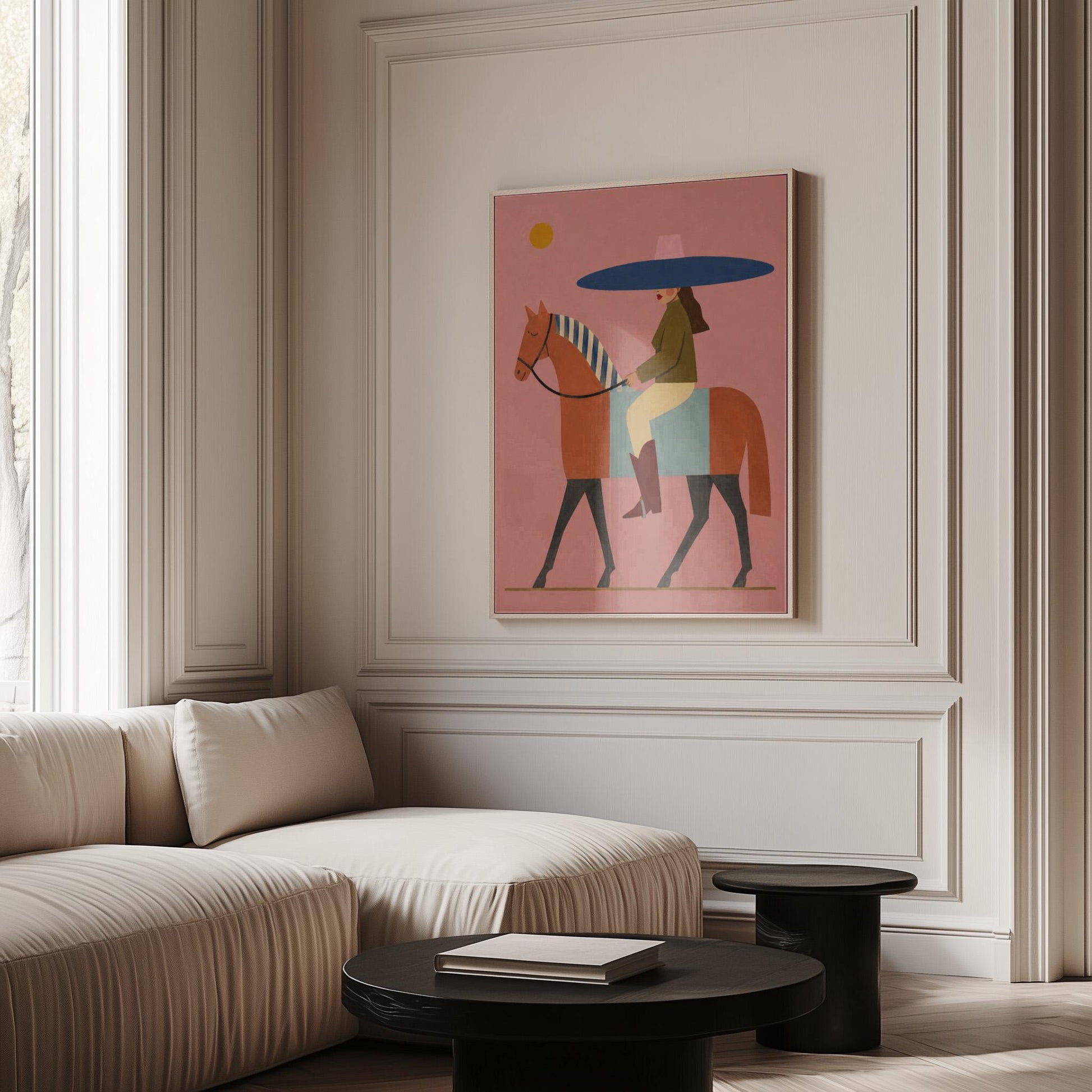 Woman in a wide navy hat riding a chestnut horse in profile on coral pink, canvas print shown to scale in a furnished room
