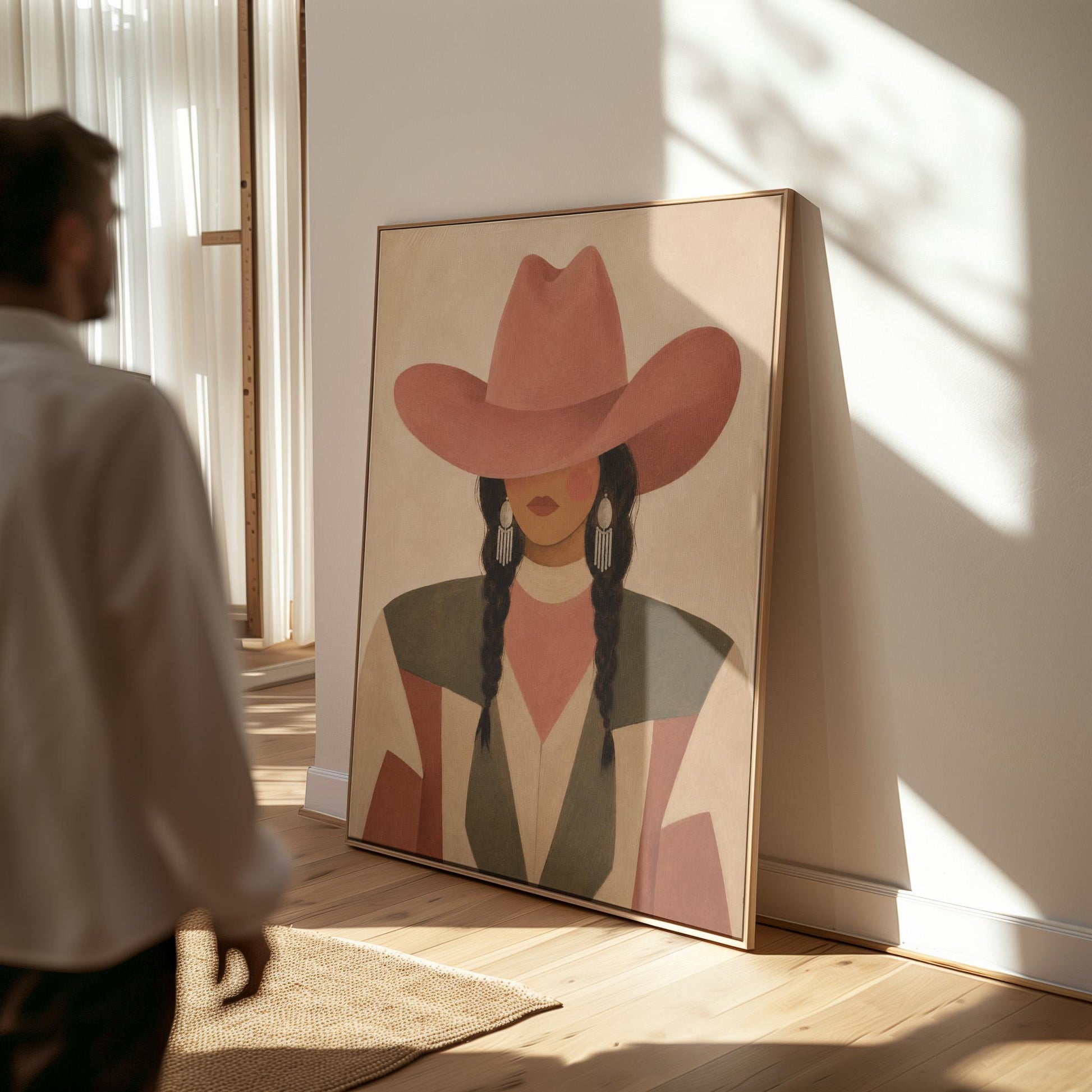 Cowgirl with dark braids under a wide terracotta hat and earthy western jacket, canvas print seen in a warm interior with natural light