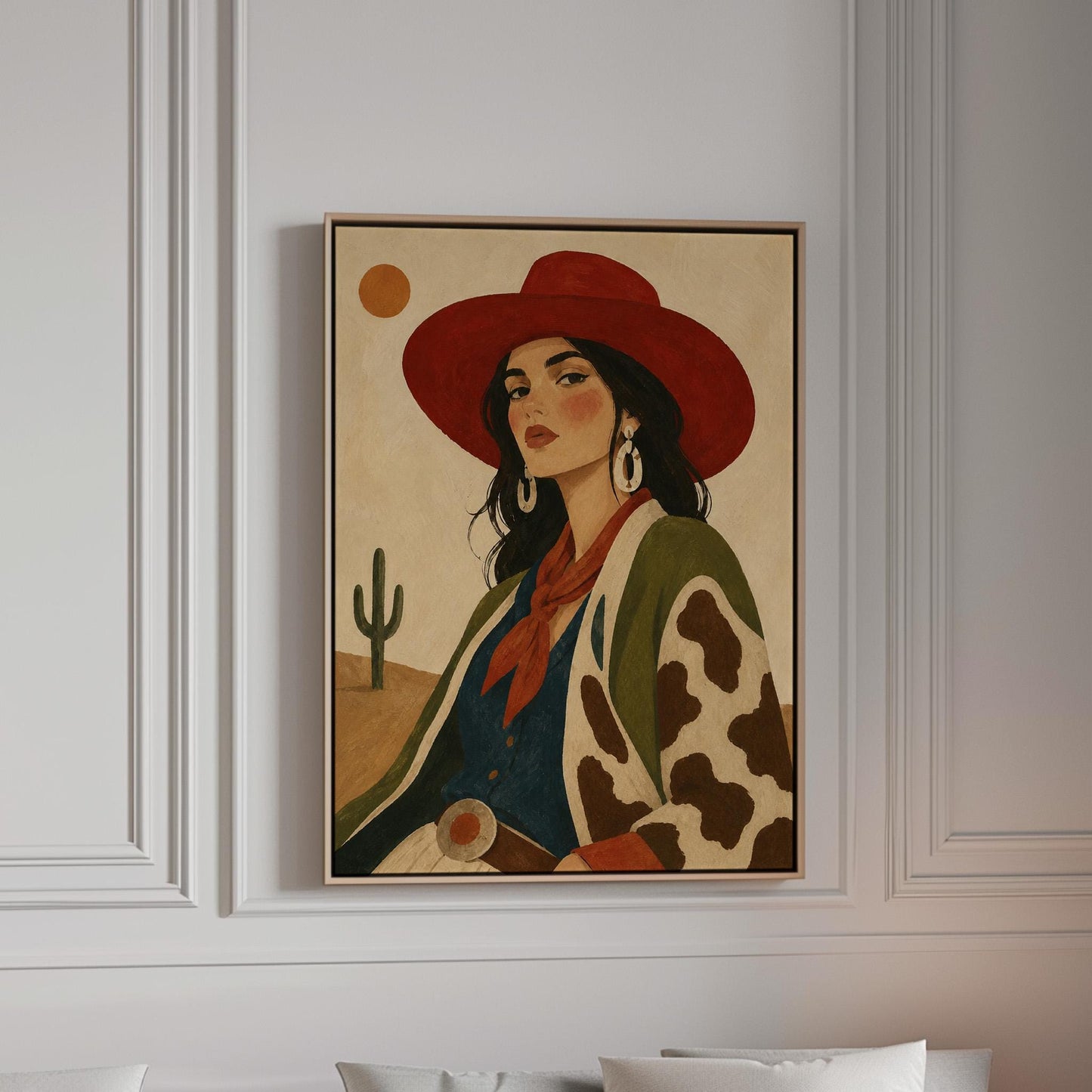 Dark-haired cowgirl in a red hat and cow-print jacket before a desert cactus, canvas print in a bright room with natural daylight