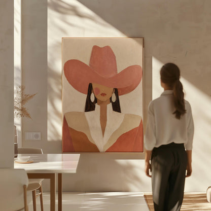Minimal cowgirl in a coral hat and white collar with dark hair on cream, canvas print seen in a warm interior with natural light
