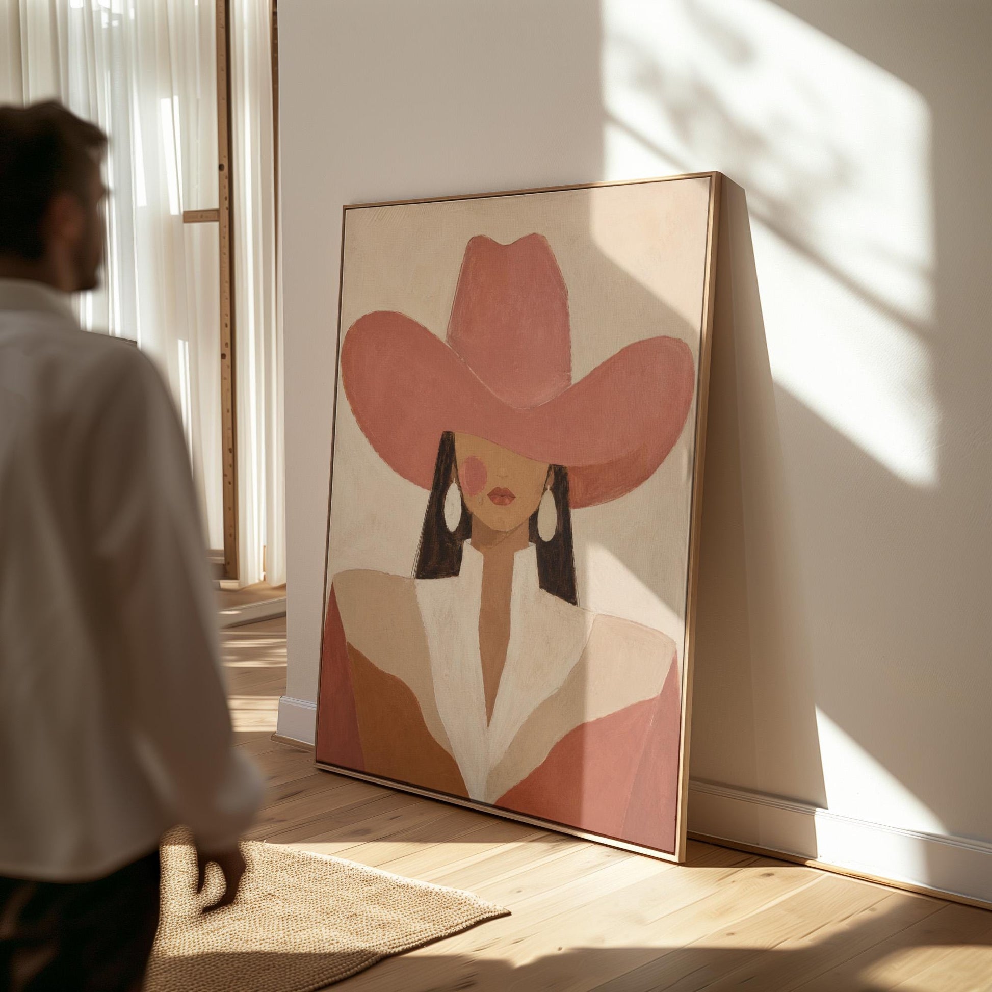 Minimal cowgirl in a coral hat and white collar with dark hair on cream, canvas print shown to scale in a furnished room