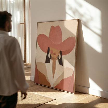 Minimal cowgirl in a coral hat and white collar with dark hair on cream, canvas print shown to scale in a furnished room
