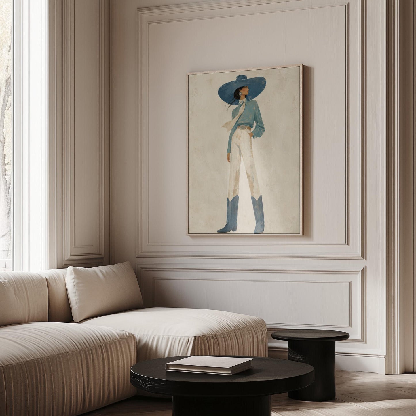 Full-figure cowgirl in a wide teal hat, blouse and boots with cream trousers, canvas print shown in a sunlit, contemporary room