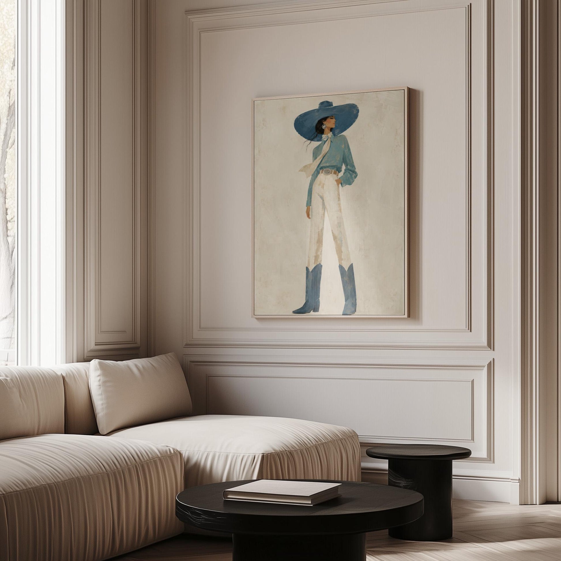 Full-figure cowgirl in a wide teal hat, blouse and boots with cream trousers, canvas print shown in a sunlit, contemporary room