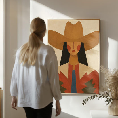 Folk cowgirl in a tan hat with rosy cheeks and a red aztec jacket on cream, canvas print hanging in a calm, modern living space