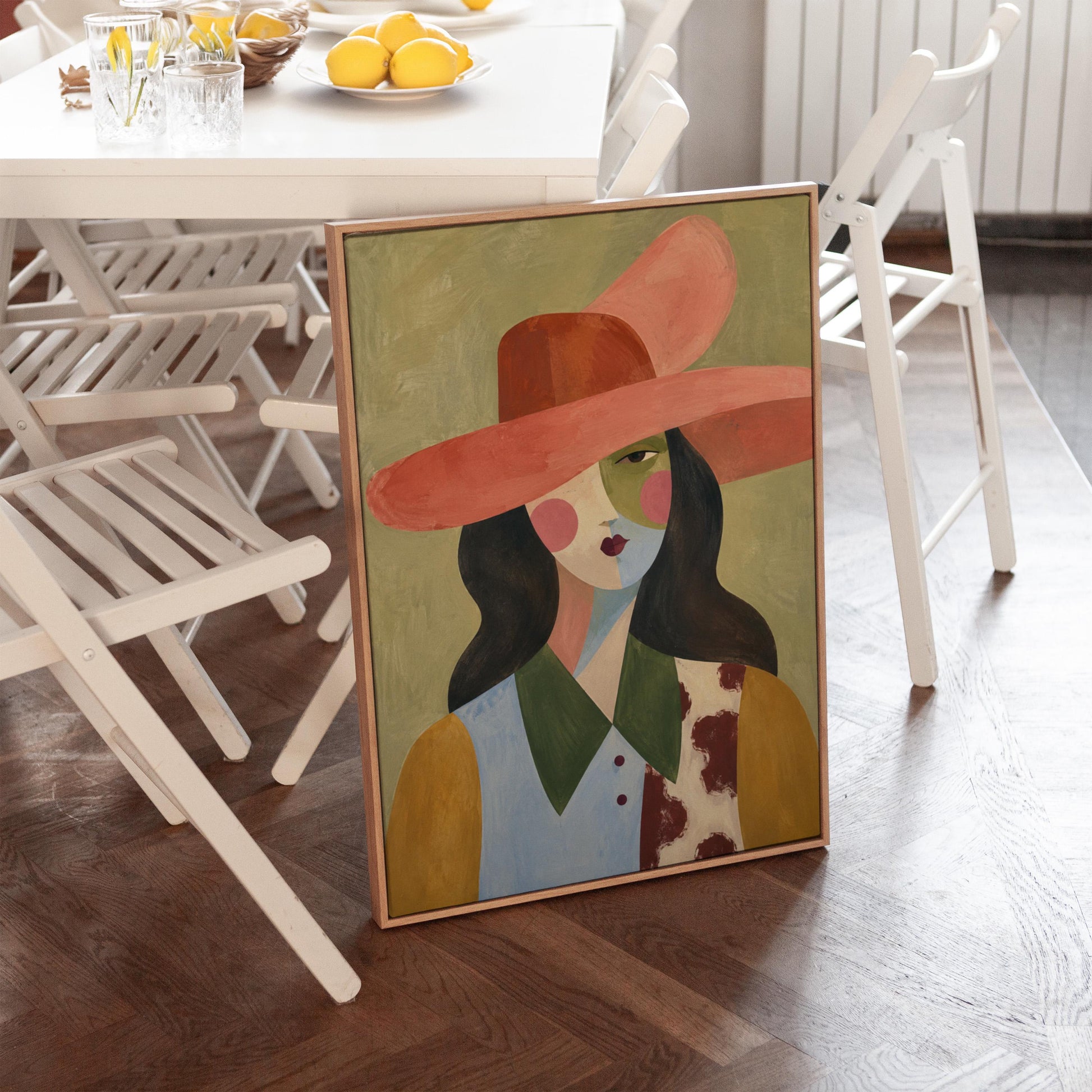 Abstract cowgirl in a wide coral hat with a cow print vest and dark hair, canvas print styled against a soft white wall