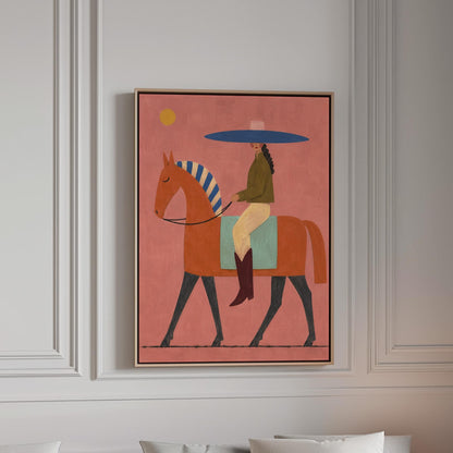 Cowgirl in a broad blue hat riding a rust red horse across a coral sky, canvas print in a bright room with natural daylight