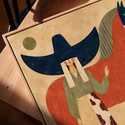 Woman in a navy hat standing by a red horse with a dark head under a moon, canvas print in a warm, minimally styled interior