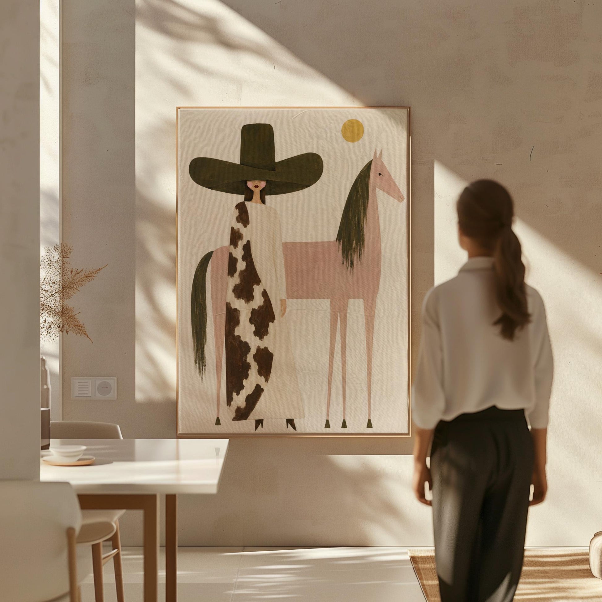 Woman in a tall dark hat standing beside a soft pink horse with olive mane, canvas print on a quiet wall in a considered interior