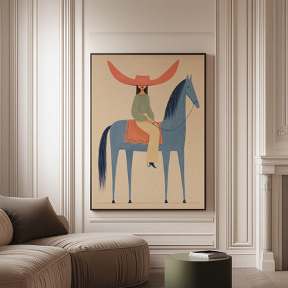 Cowgirl in a dramatic red hat riding a slender blue horse across pale sand, canvas print on a softly lit wall in a calm interior