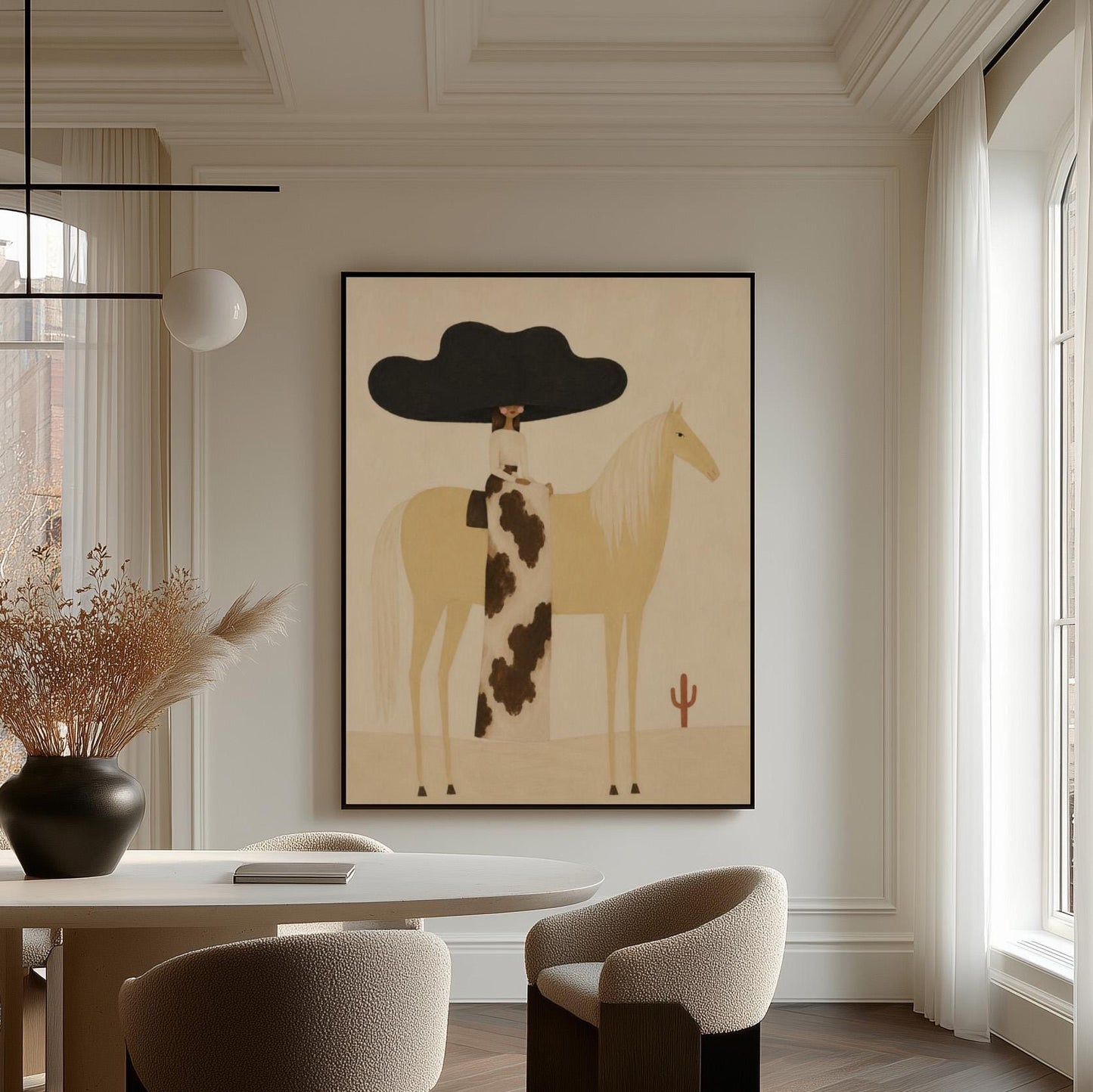 Woman in a huge black hat riding a pale palomino across a desert with cactus, canvas wall art hanging in a calm, modern living space