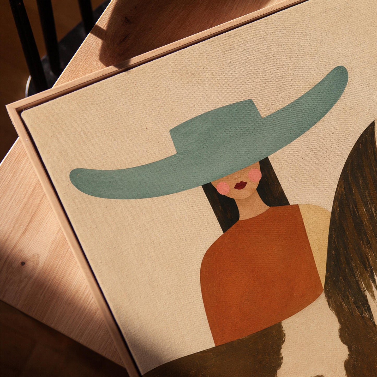 Woman in a teal hat beside a brown and white pinto horse in warm light, canvas print in a warm, minimally styled interior