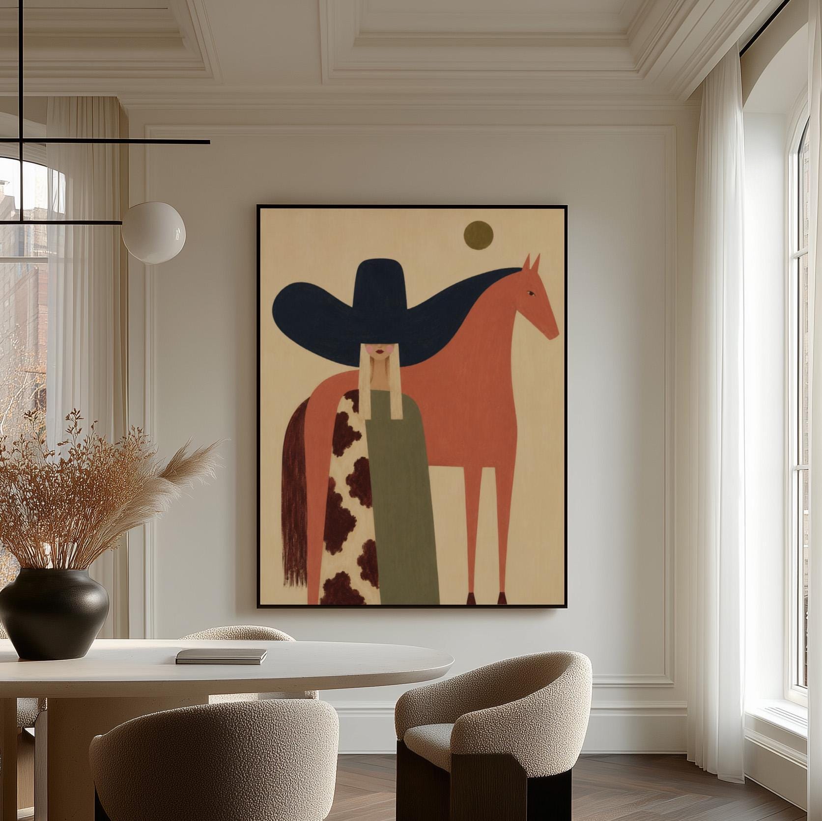 Cowgirl in a black sombrero and cow print cape beside a rust red horse, canvas print presented in a light, minimal room
