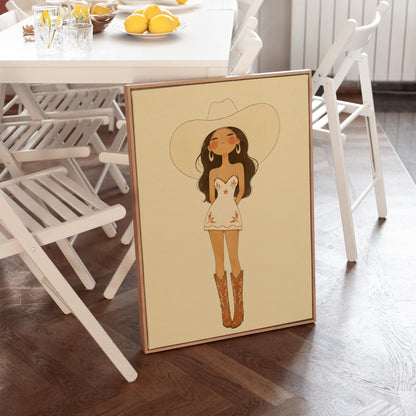 Cowgirl in a white dress, pale cowboy hat and tan boots on a cream ground, canvas print presented in a light, minimal room
