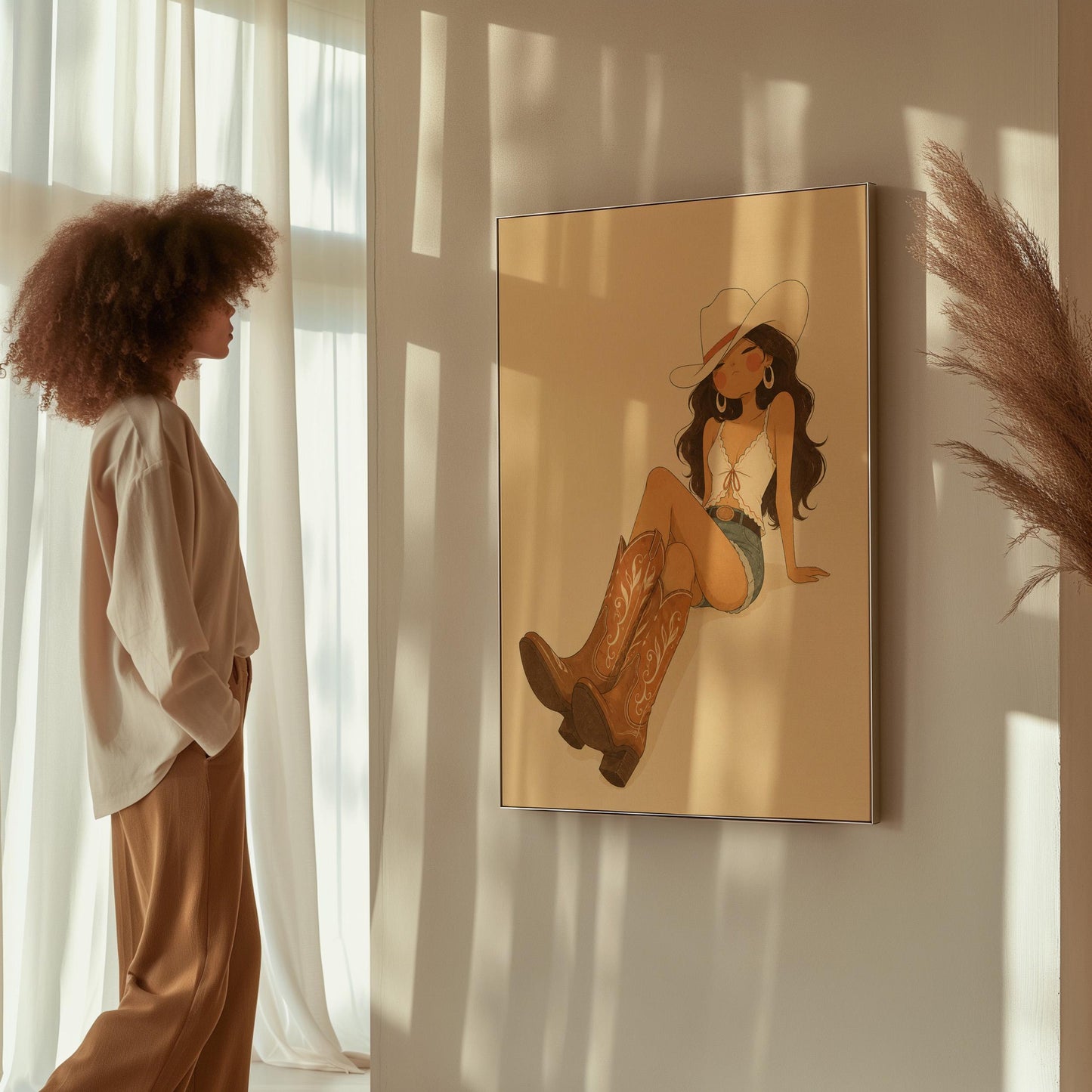 Cowgirl in denim shorts and cowboy boots leaning back under a wide pale hat, canvas print on a quiet wall in a considered interior