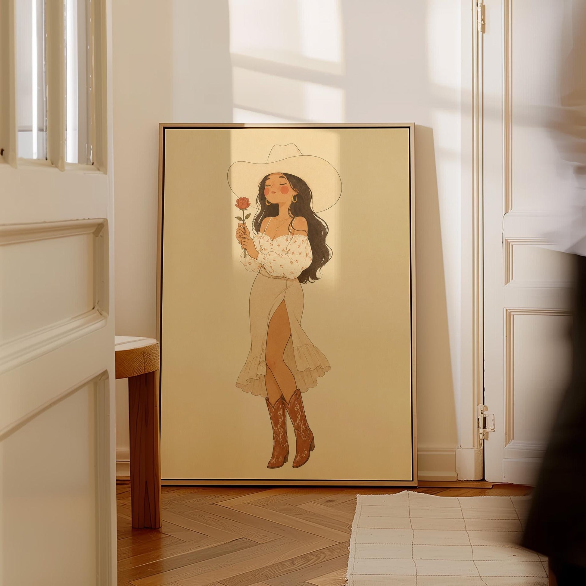 Cowgirl in white dress holding a red rose under a wide hat, canvas print seen in a warm interior with natural light