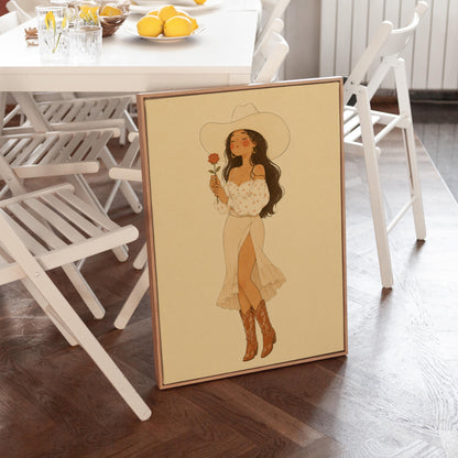 Cowgirl in white dress holding a red rose under a wide hat, canvas wall art presented in a light, minimal room